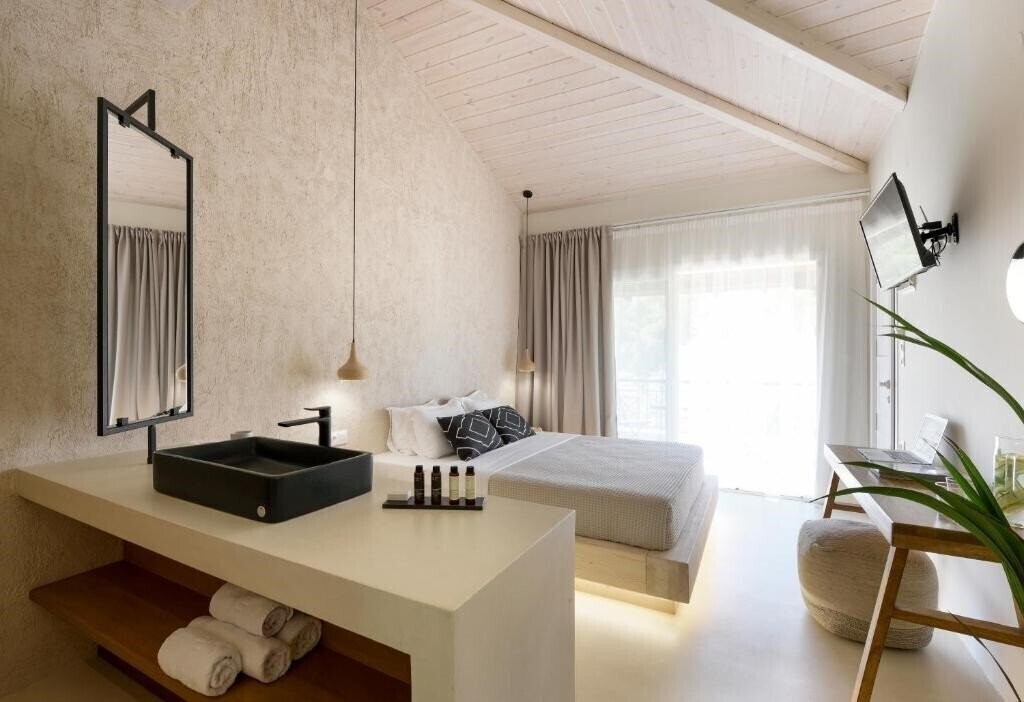 Отель Karidi Beach Boutique Suites 3*