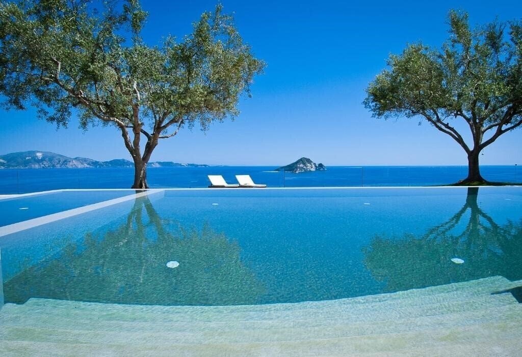 Отель Kymaros Villas 4*