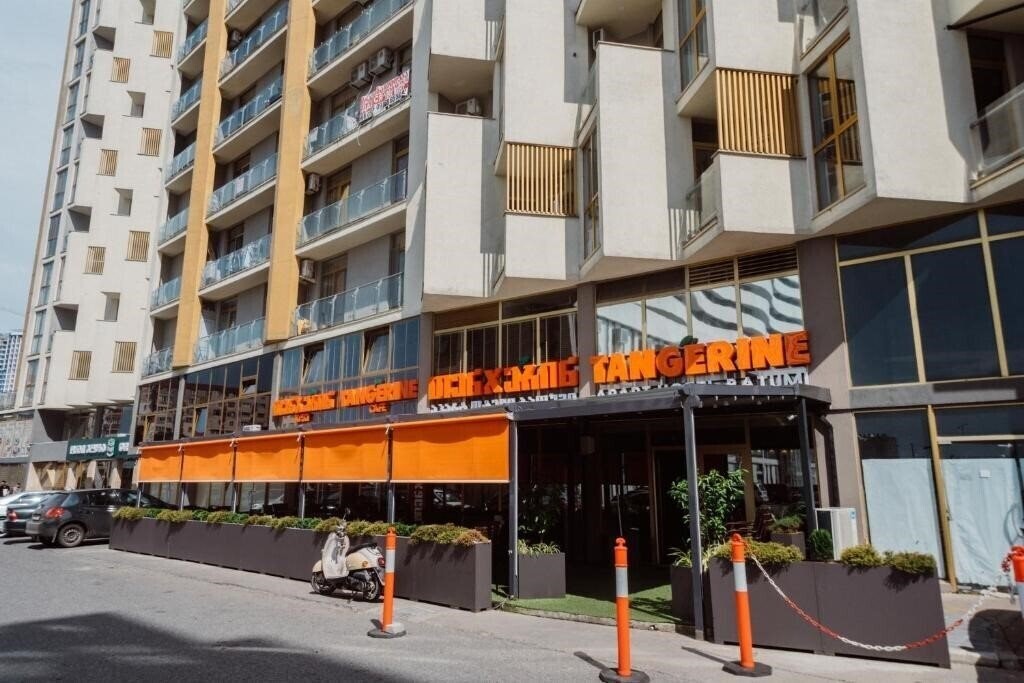 Отель Tangerine Apart Hotel 4*