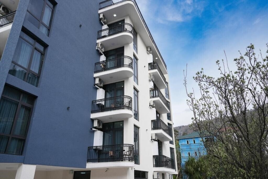 Готель Parallel Apartments 4*