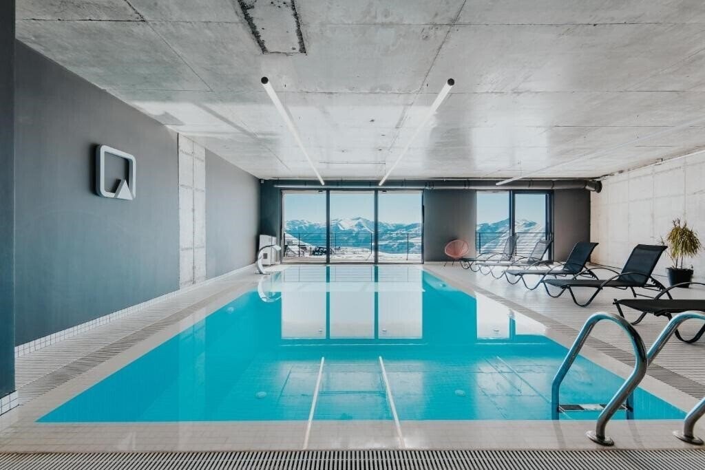 Фото Quadrum Ski & Yoga Resort Apart апартаменты