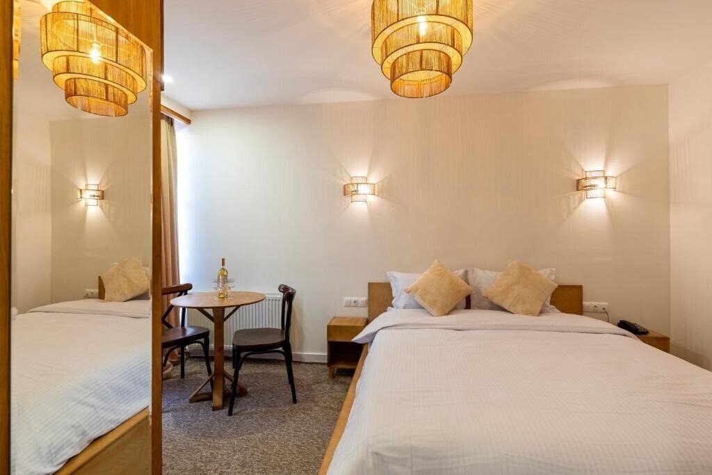 Фото Palm Tbilisi Boutique Hotel 4*