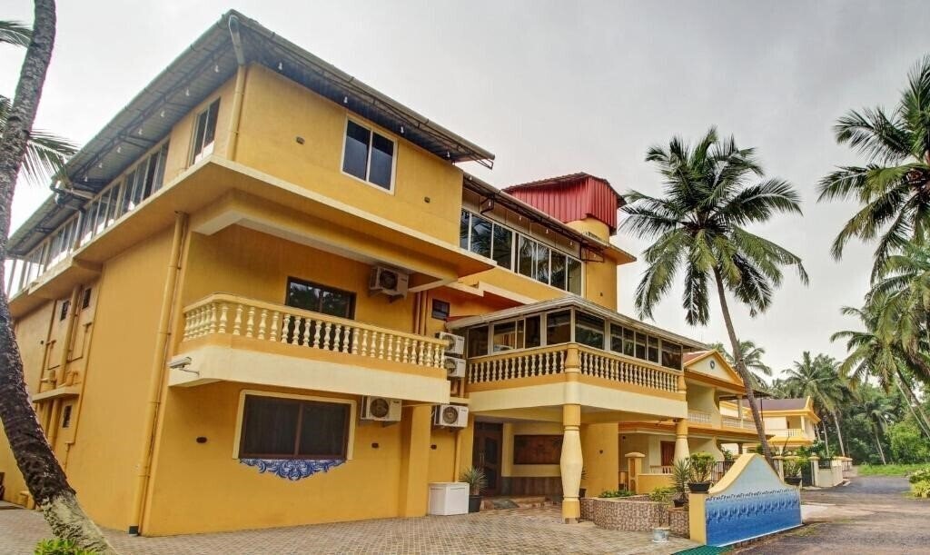 Отель Treebo Majestic Palms 2*