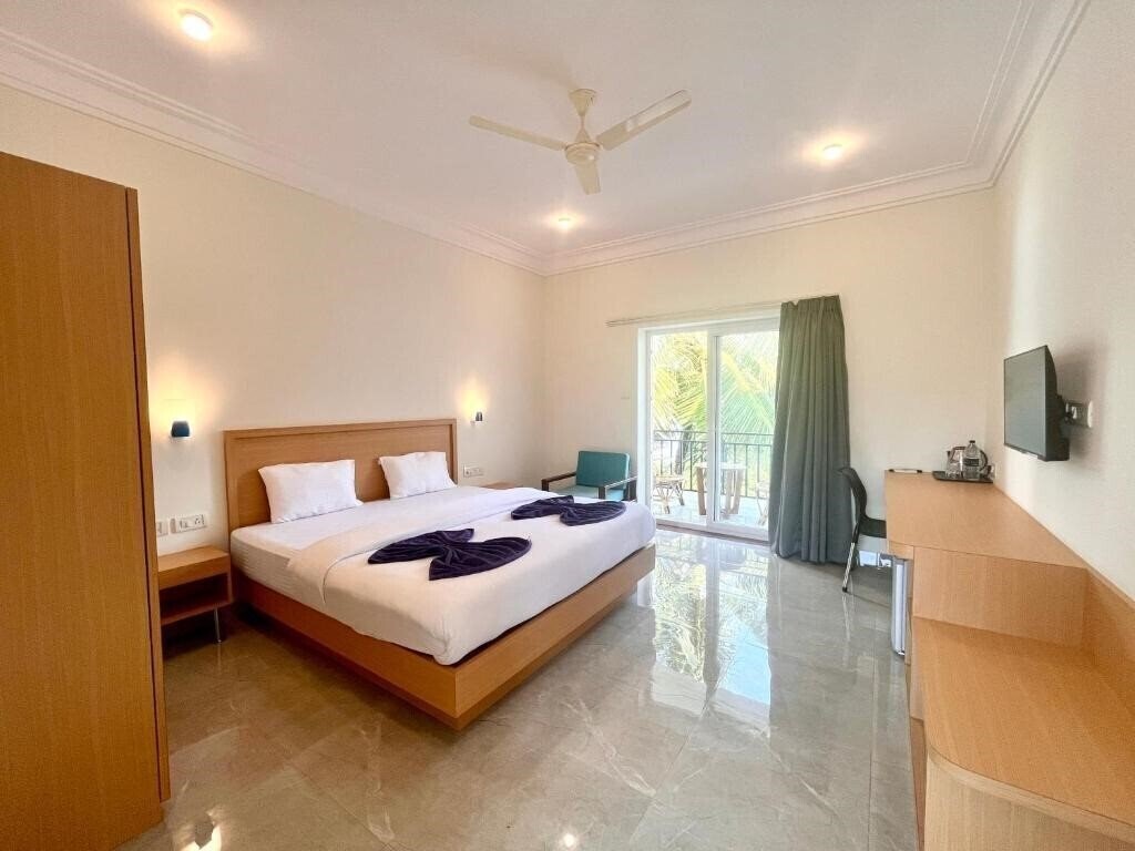 Фотографія Morjim Sunset Guest House 2*
