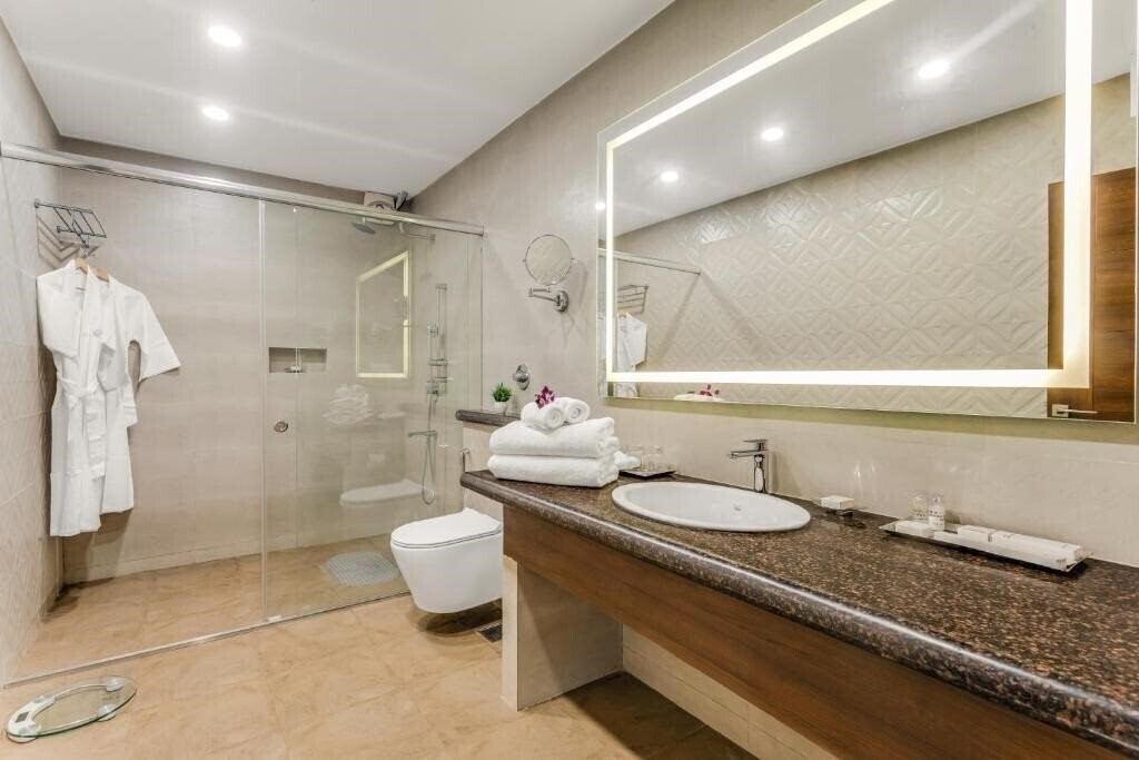 Фотографія Masaka Suites 4*