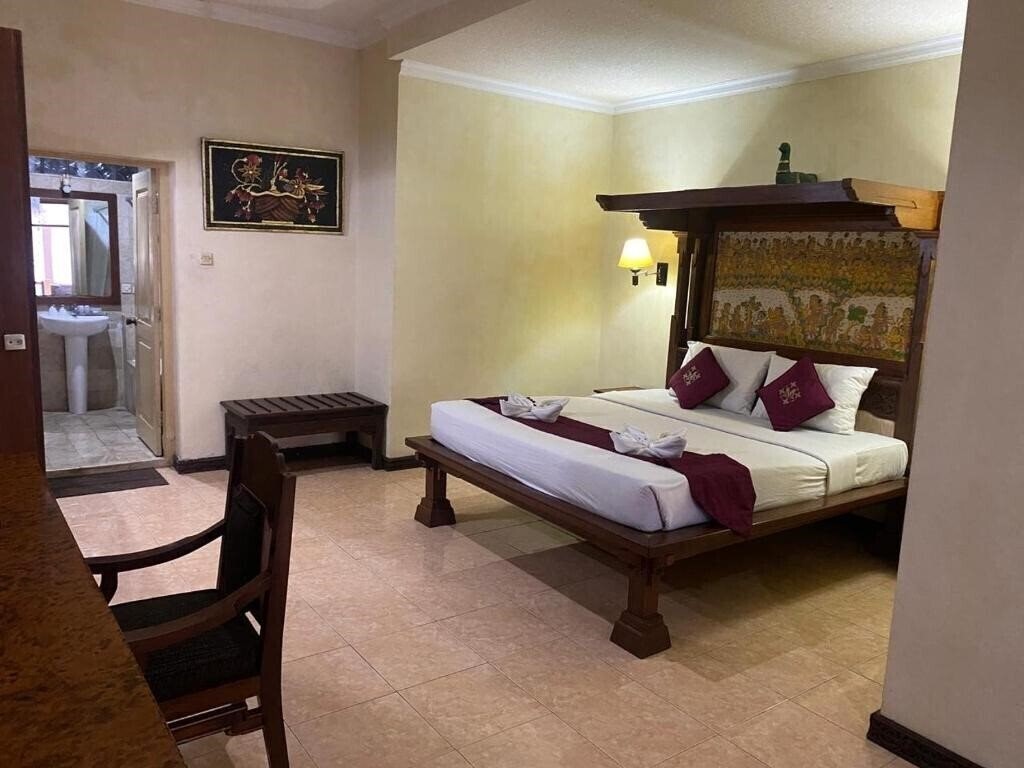 Фотография Melasti Kuta Beach Bungalows & SPA 3*