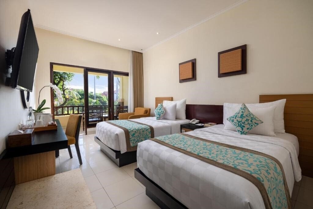Фото Adhi Jaya Hotel 4*