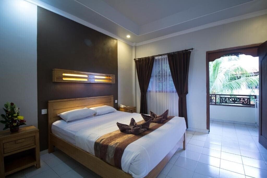 Фото Bakung Sari Resort Kuta 3*