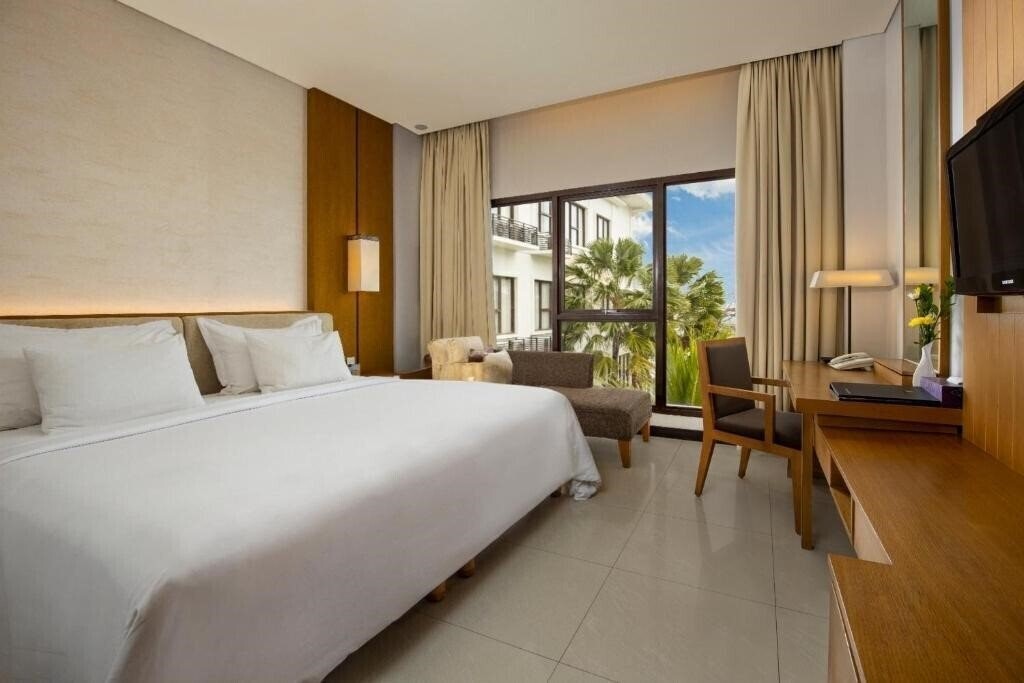 Фото Grand Inna Kuta 4*