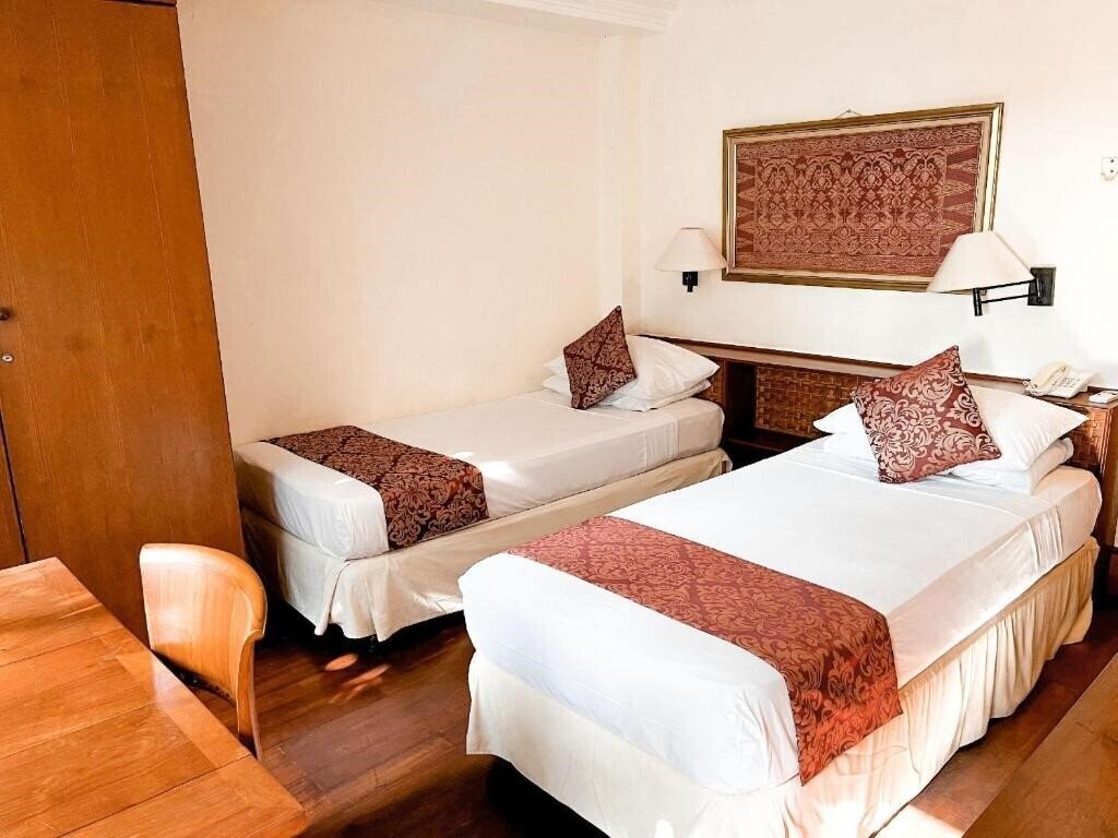 Отель Club Bali Family Suites @ Legian Beach 4*