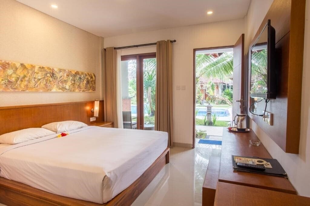 Фото Sinar Bali Hotel 3*
