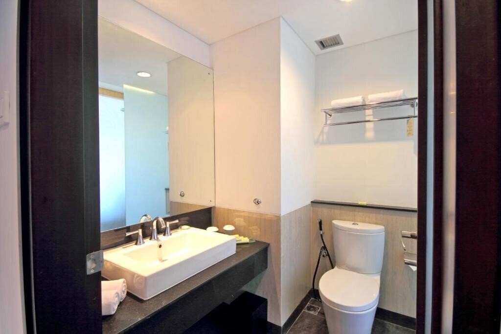 Фотографія Hotel Santika Siligita 3*