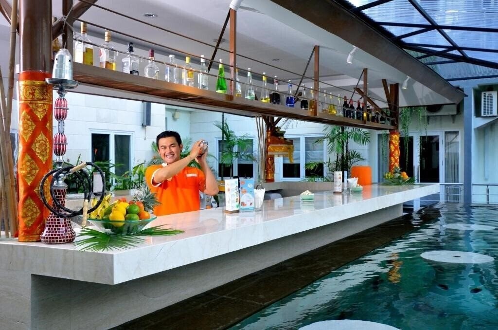 Фотографія Harris Hotel & Residences Riverview Kuta 4*