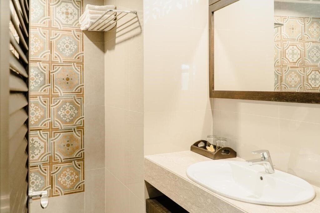 Фотографія Palm Beach Hotel Bali 3*