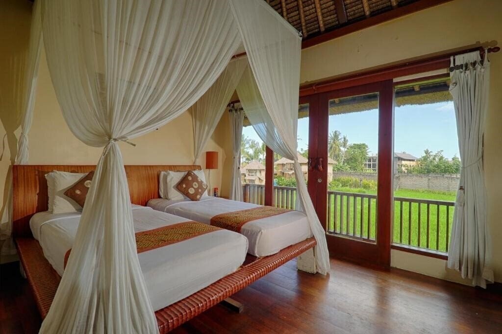 Фото Biyukukung Suites & Spa 4*