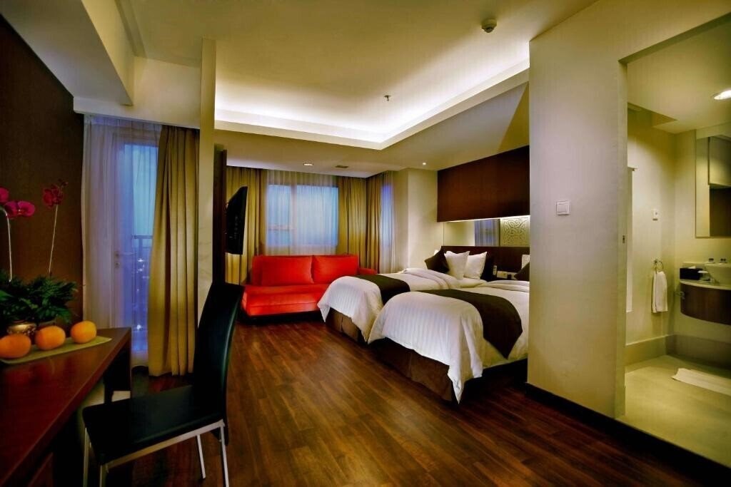 Отель Aston Pluit Hotel And Residense 4*