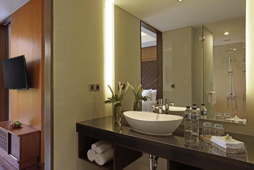 Фото Golden Tulip Jineng Resort 4*