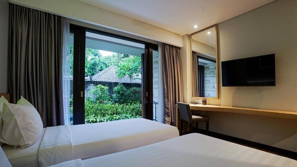 Фото Grand Whiz Hotel Nusa Dua Bali 4*