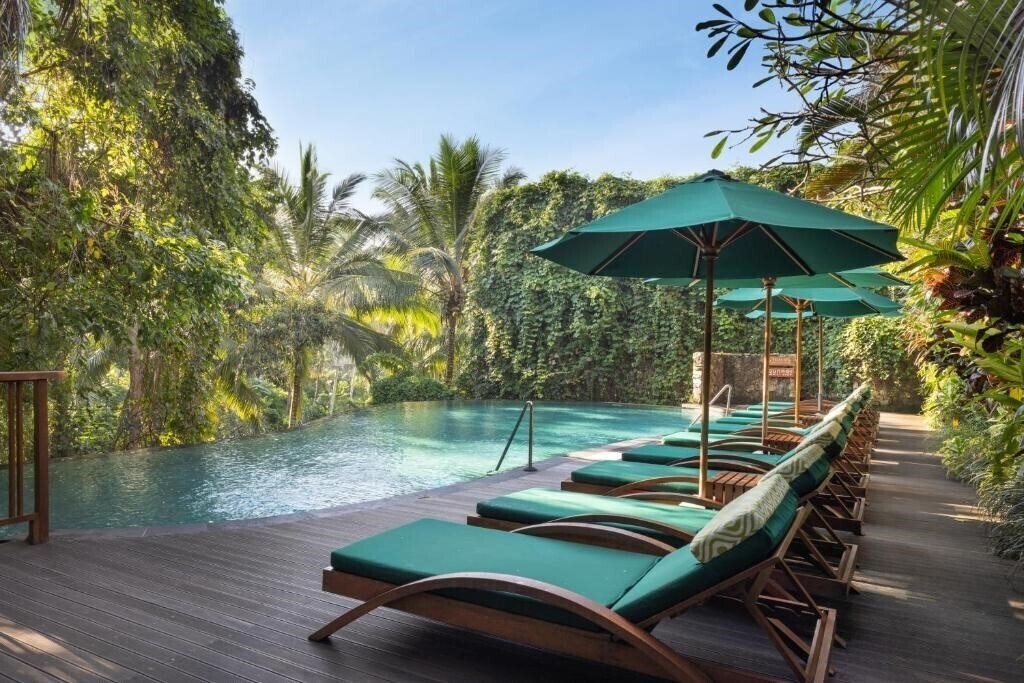 Готель Adiwana Unagi Suites 4*