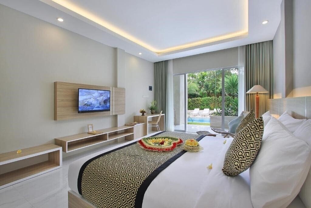 Фото Tapa Tepi Kali Hotel 3*