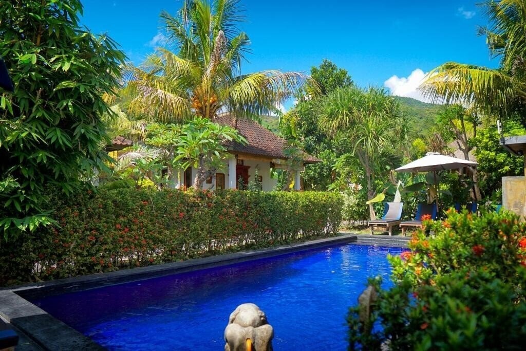 Отель Amed Cafe & Bungalows 4*