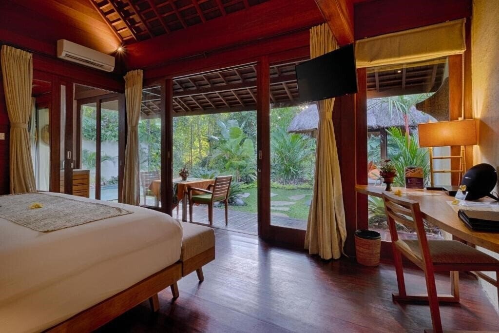 Фото Ubud Padi Villas 4*