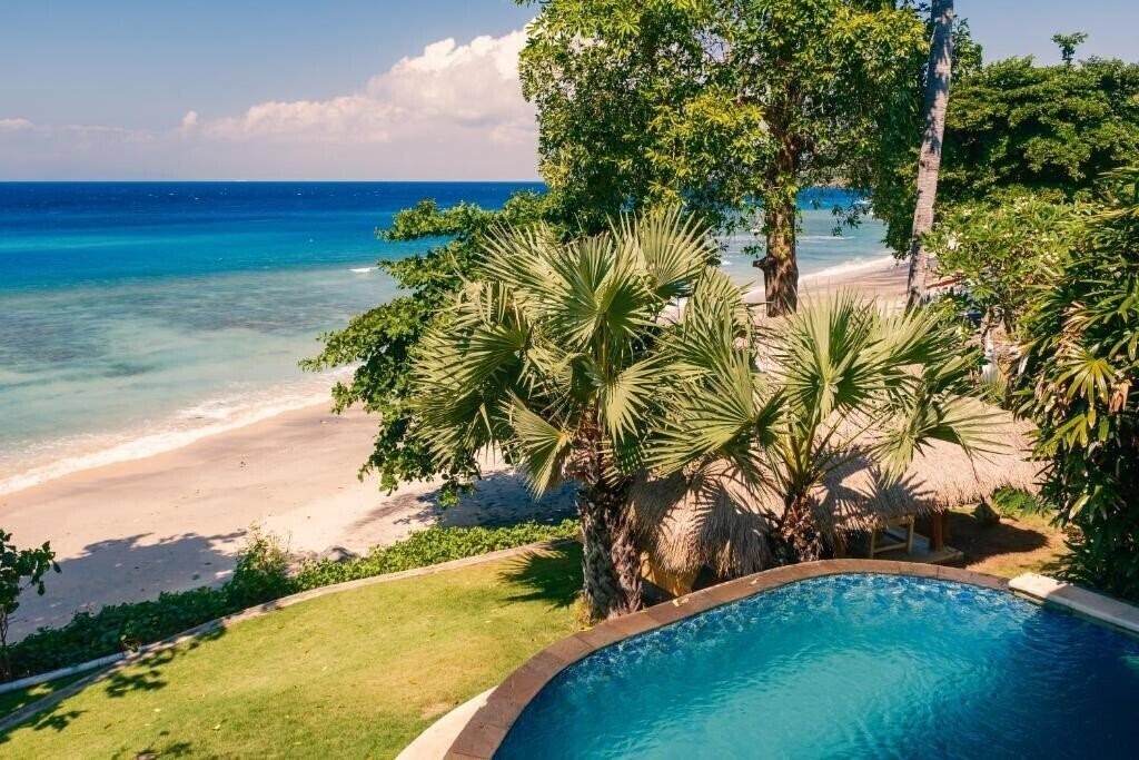 Отель Aquamarine Beach Villas 4*