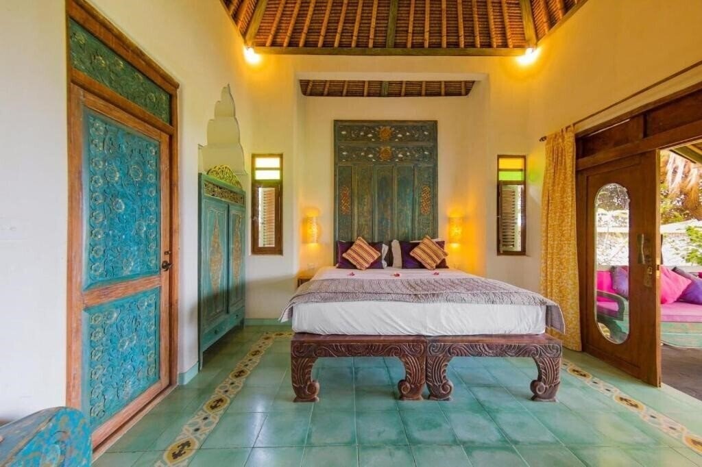Фото Life In Amed Bali 4*