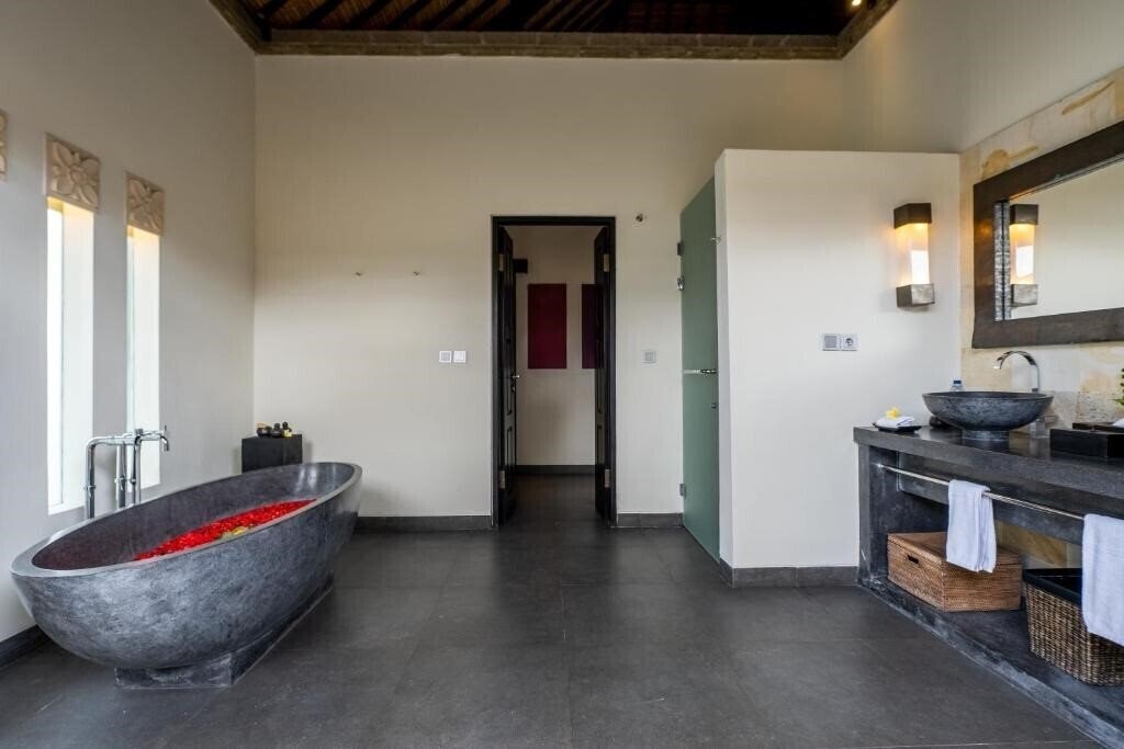 Фотографія Villa Rumah Lotus 4*
