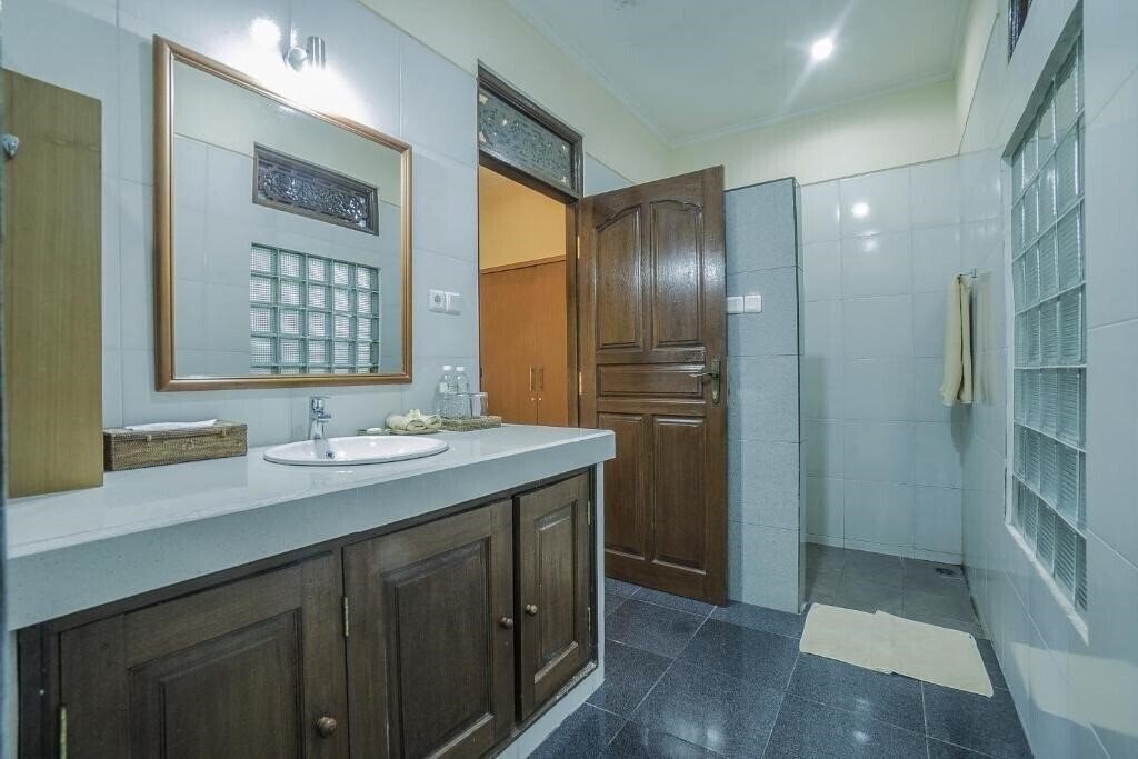 Фотография Nyoman Sandi Guest House 3*