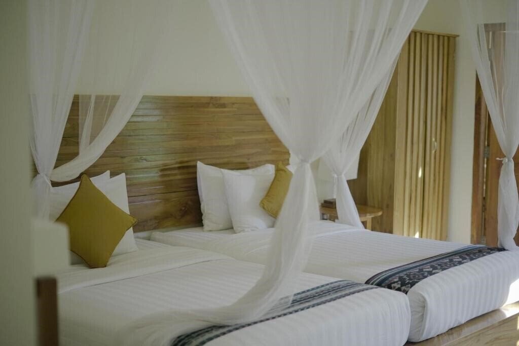 Фотографія Puri Sari Beach Hotel 3*