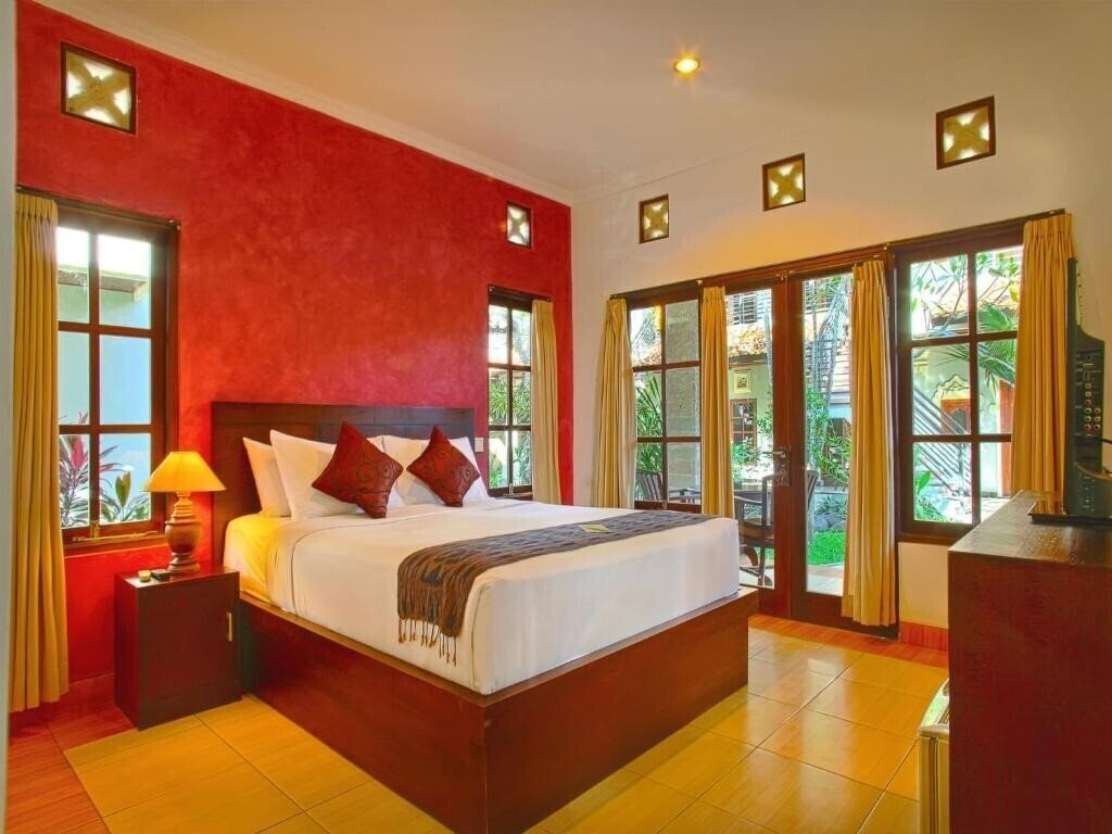 Фото Puri Sading Hotel 4*