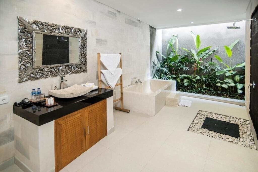 Фотографія Sandi Agung Villa Bidadari 4*