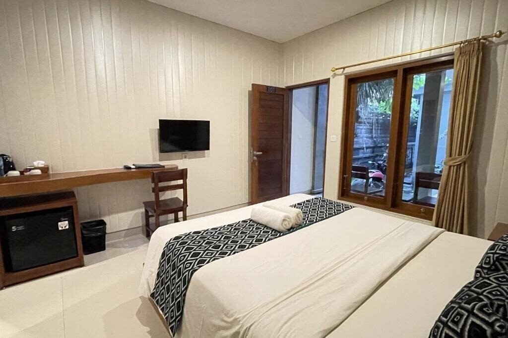 Фотография Singgah Hotel Seminyak 4*