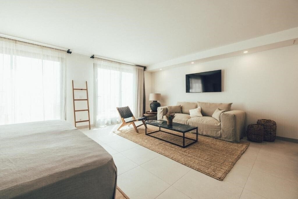 Фото Cala Lanuza Suites 4*