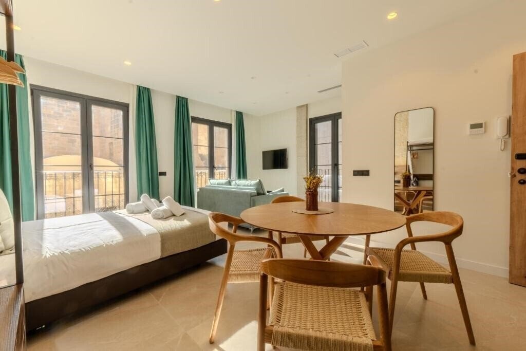 Фотография Apartamentos La Basilica by BeAlicante 3*