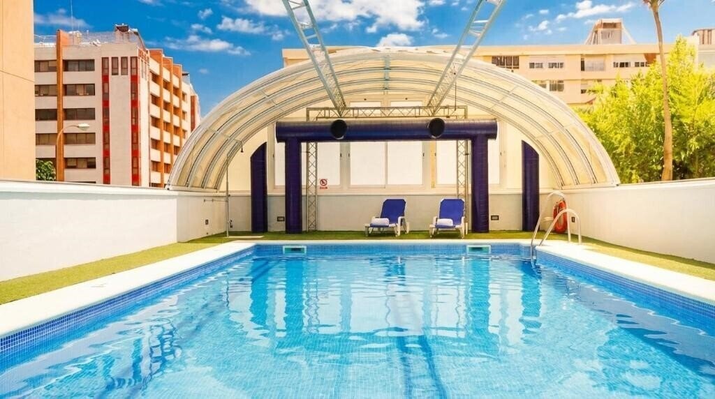 Отель Vertice Sevilla 4*