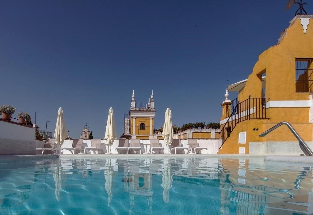 Фотографія Las Casas De La Juderia Seville 4*