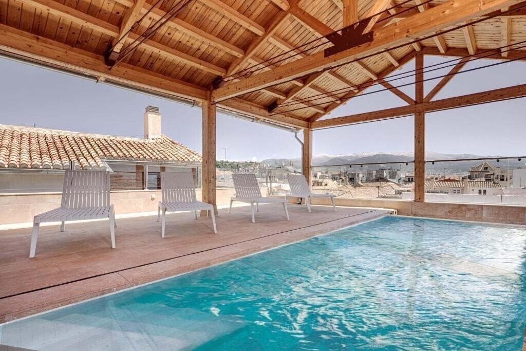 Готель Sercotel Granada Suites 4*