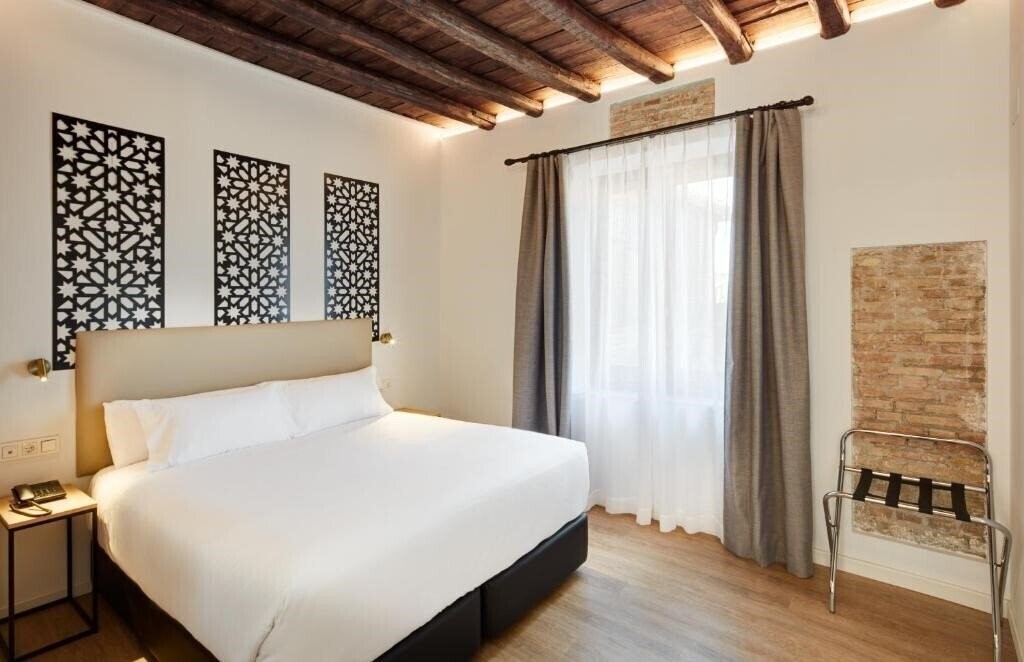 Фото Sercotel Granada Suites 4*