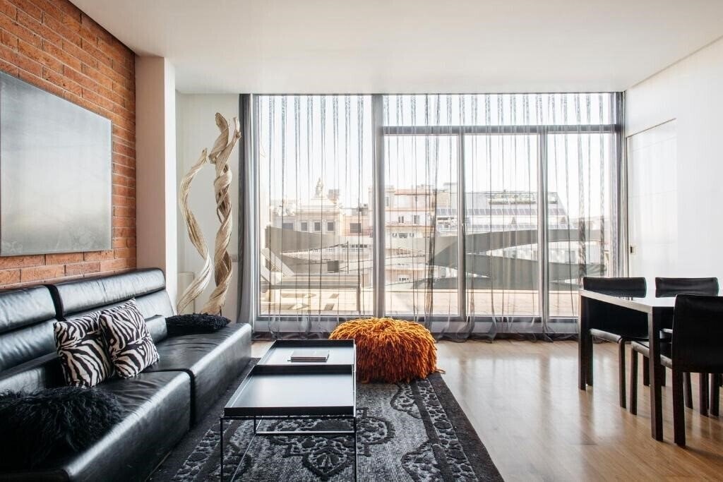 Отель Barcelona Apartment Suites Avenue Luxe 4*