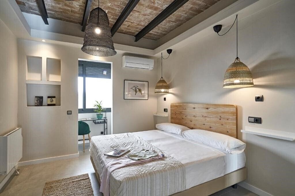 Фото Ainb Eixample Miro апартаменты