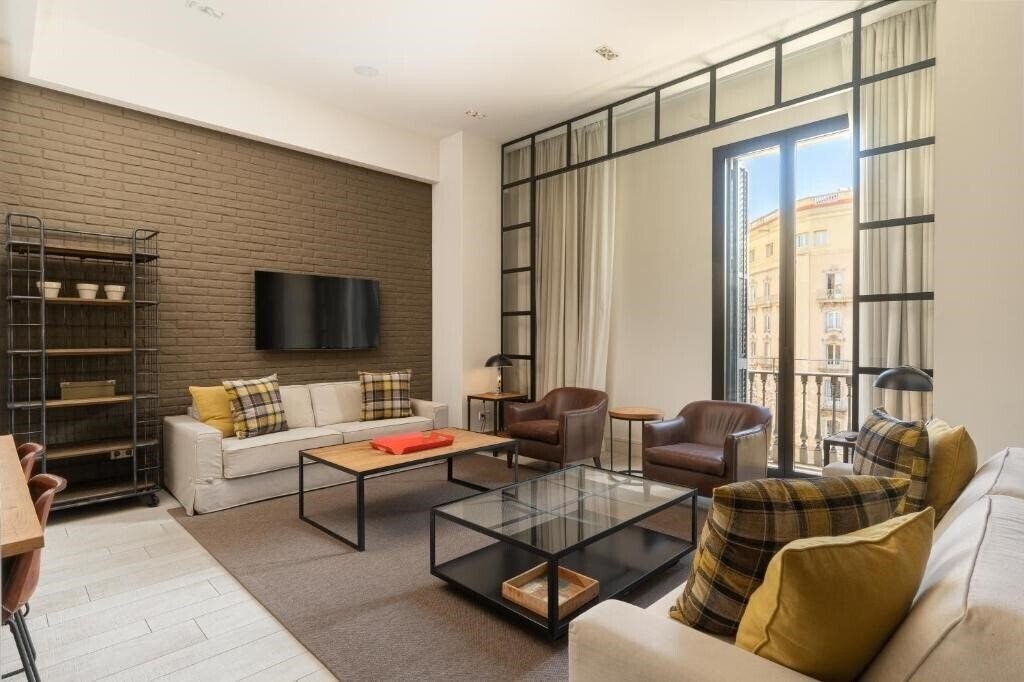 Фотографія Midtown Apartments апартаменты