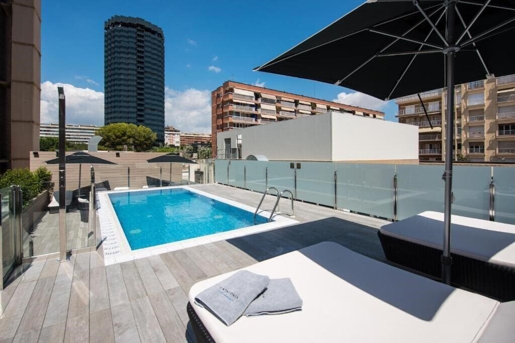 Отель Catalonia Rigoletto Hotel 4*
