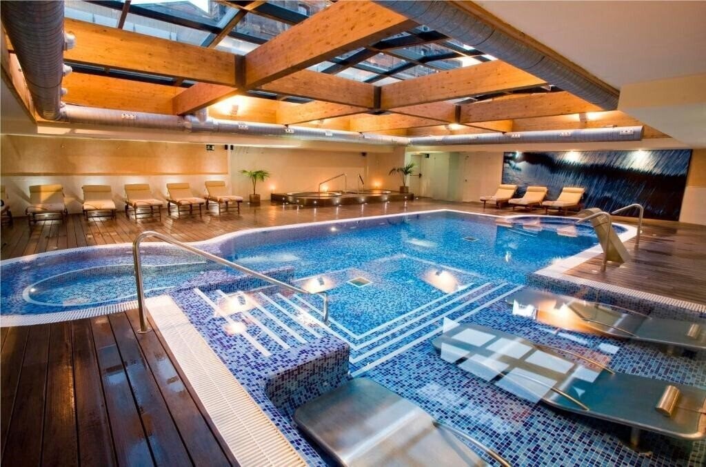 Отель Villa Olimpica Suites 4*