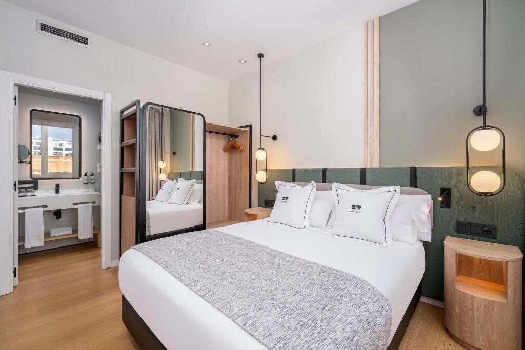 Фото Villa Olimpica Suites 4*