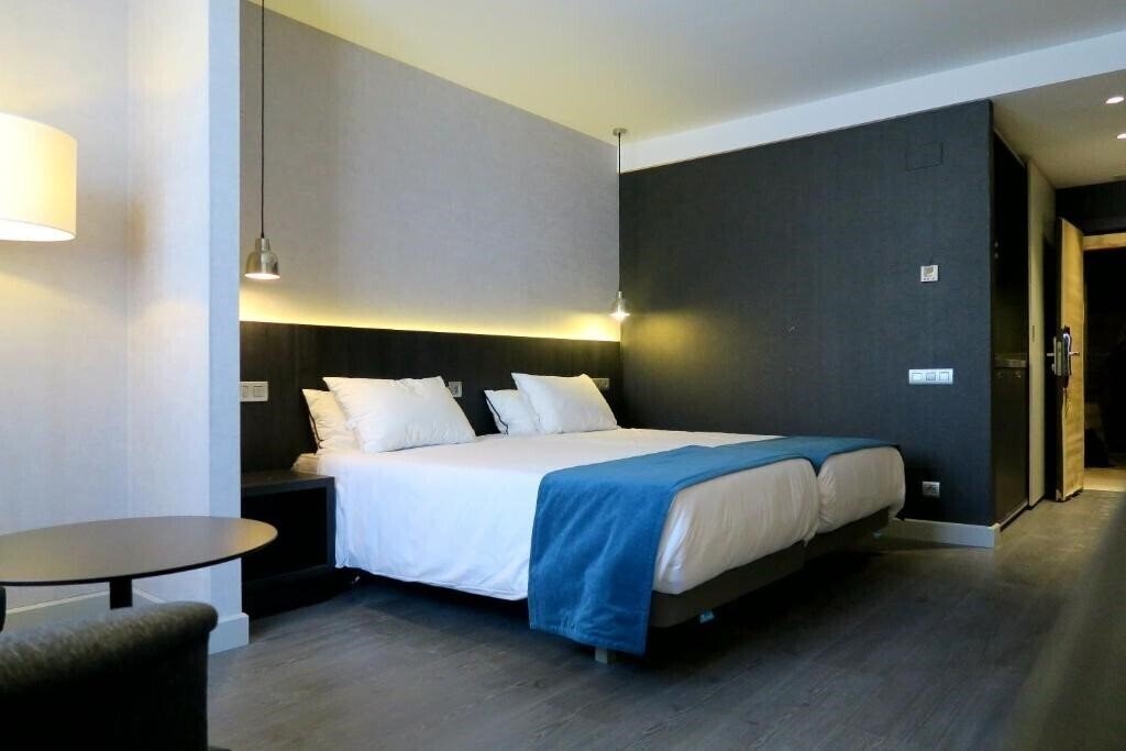 Фото Hg City Suites Barcelona 4*