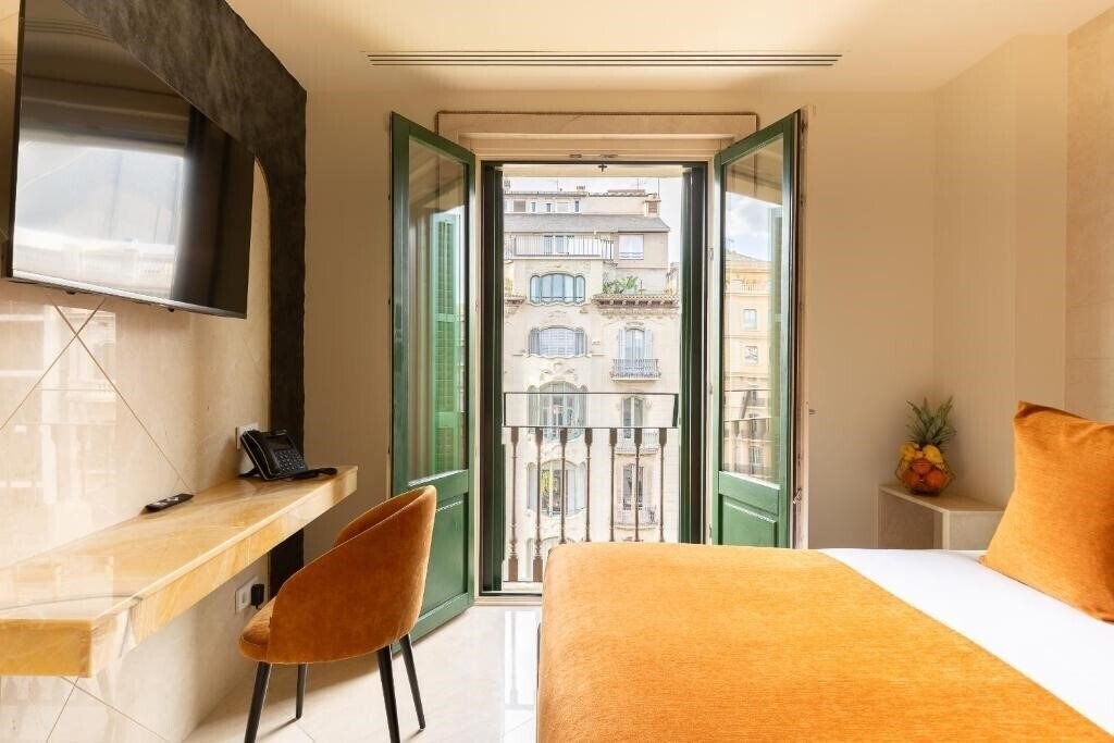 Фото Cosmo Apartments Rambla Catalunya 4*