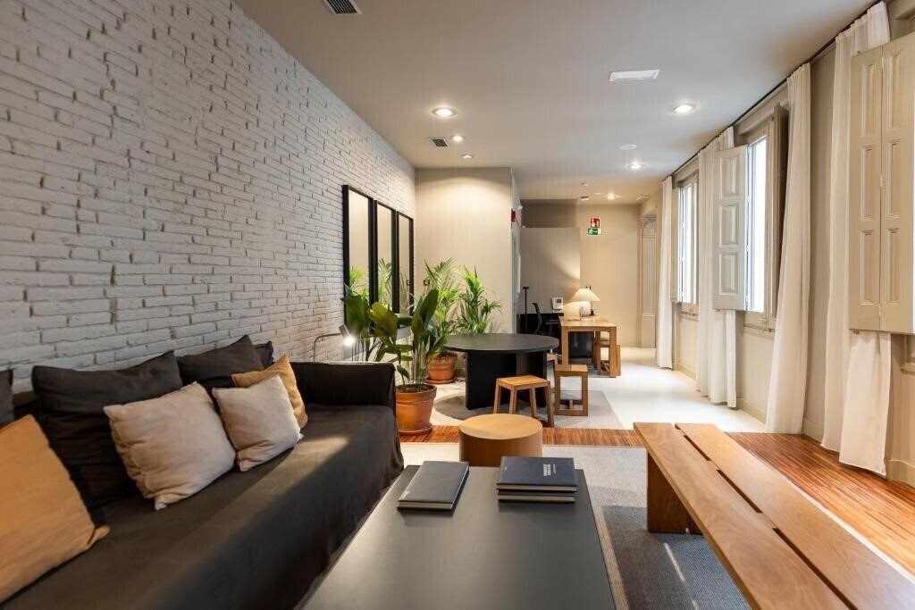 Фото Uma Suites Pau Claris 3*