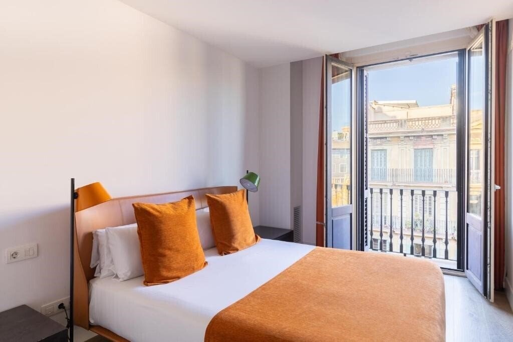 Фото Cosmo Apartments Passeig De Gracia 4*